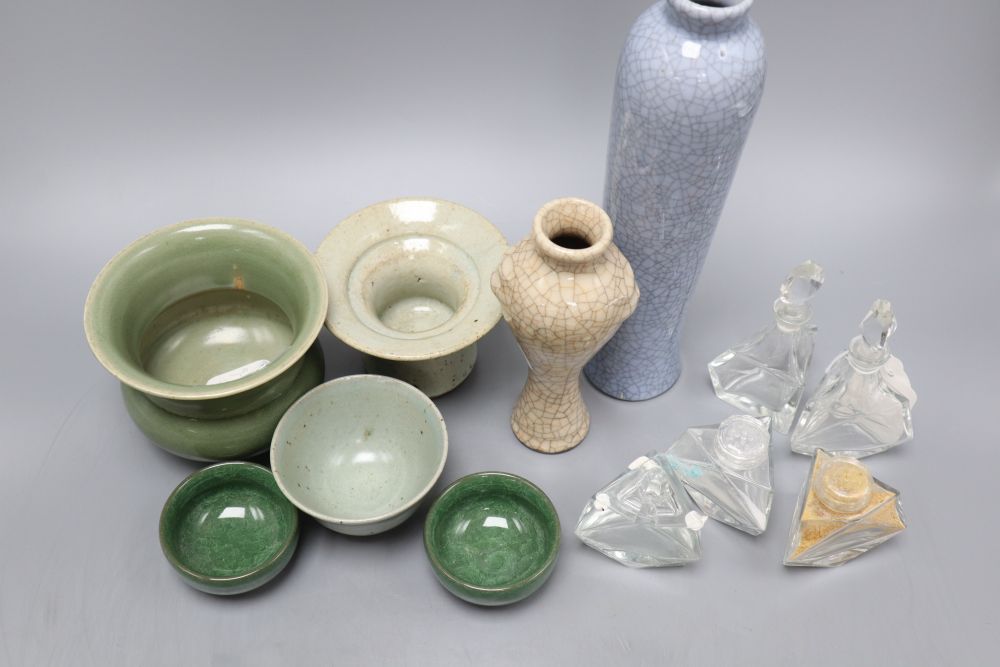 Five Oriental celadon type bowls or vases and two crackleware vases and five glass condiments, tallest 26cm